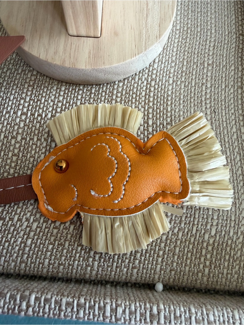No Boundaries Orange Fish Bag Charm with Raffia Fringe Accent
